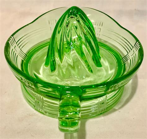 00 shipping Vintage Depression Glass Green Vaseline Citrus Manual Juicer Reamer 6" Kitchen 16. . Vintage green glass juicer